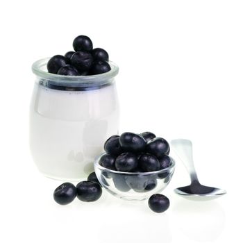 Old-fashioned yogurt jar and Blueberries on white background