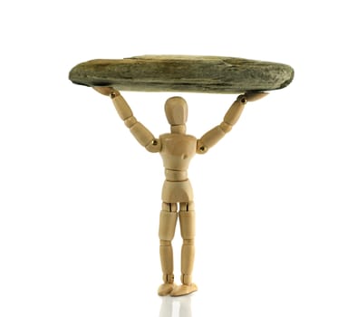 wooden pupet with heavy stone above his head