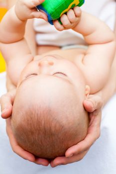 Mother holding little baby girl