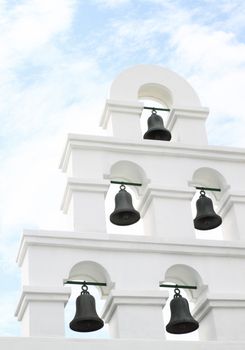 White bell tower with the sky