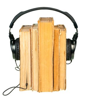 HI-Fi headphones on old books row isolated on white