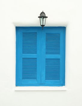 Greek Style windows and lamp on white wall