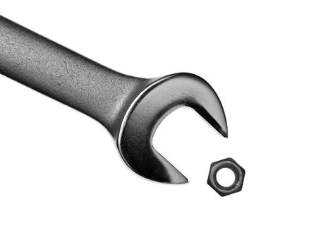 Wrong wrench for hex nut on white background