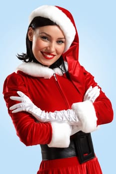 Portrait of beautiful young woman wearing santa claus clothes