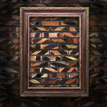 old picture frames on a brick wall in a grunge style