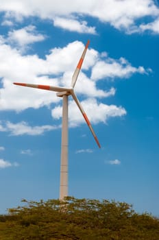 A windmill with a deep blue sky in La Guajira, Colombia