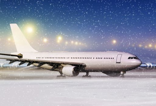 airport and white aircraft at non-flying weather, winter time