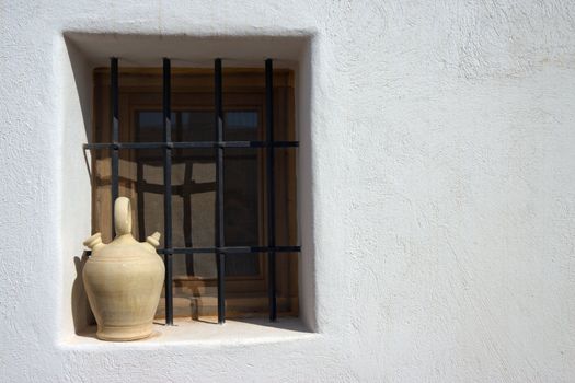 Spanish typical jar in window (horizontal) in Mijas Town (Almeria - ESPA�A)