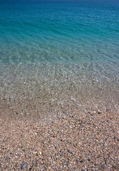 beach and blue sea in Spain. Mediterranean Sea.