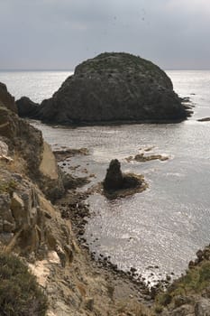 stone island in the coastal landscape, in Spain. Mediterranean Sea