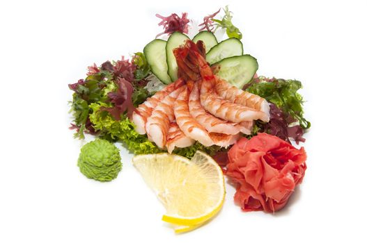 Japanese cuisine sashimi with vegetables and fish in a restaurant