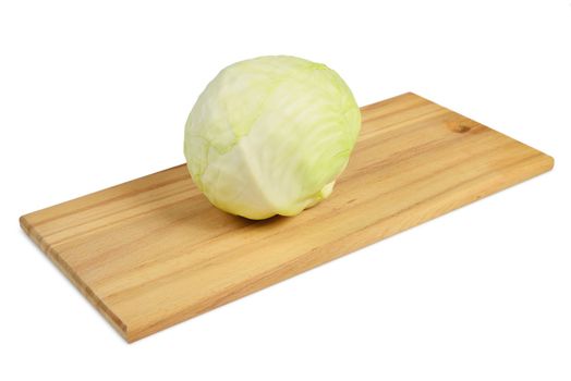 Cabbage on a cutting board. Isolated on white.