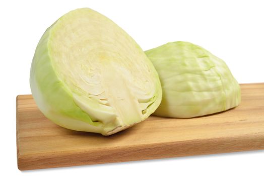 Cabbage on a cutting board. Isolated on white.