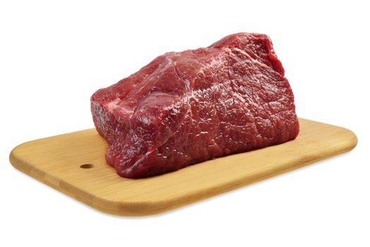 Beef on a wooden board. Isolated on white