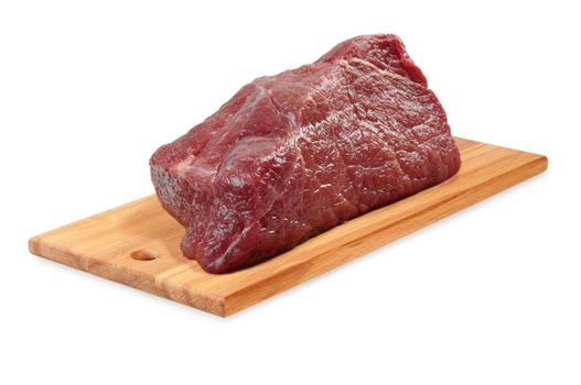 Beef on a wooden board. Isolated on white