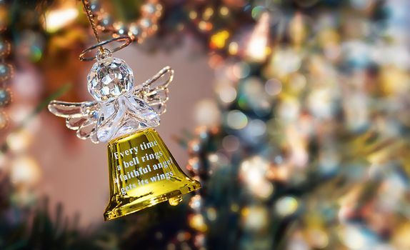 Golen Angel Bell on a Christmas Tree