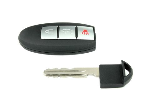 car key with remote control set on white background