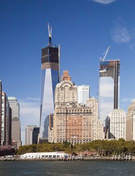 The New York City skyline at afternoon w the Tower 4 and Freedom tower under construction