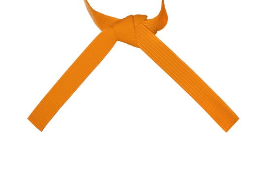 Karate orange belt tied tied in a knot