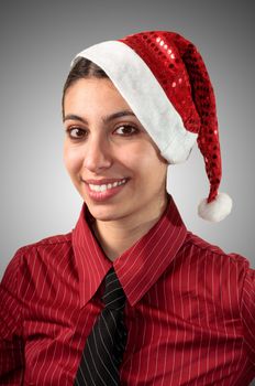 smiling business christmas girl on grey background