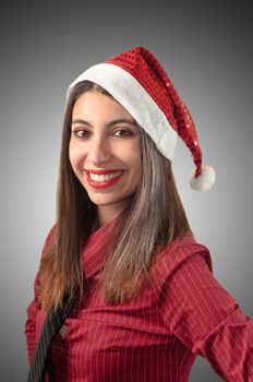 smiling business christmas girl on grey background