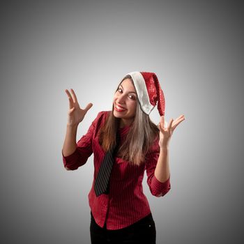smiling business christmas girl on grey background
