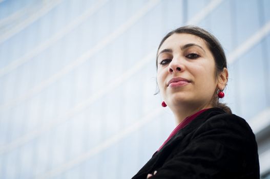 business girl in front of a modern building