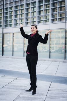 success business girl in front of modern building