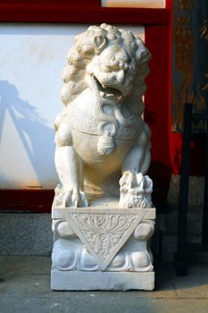 White Feng Shui lion in a Chinese Buddhist temple