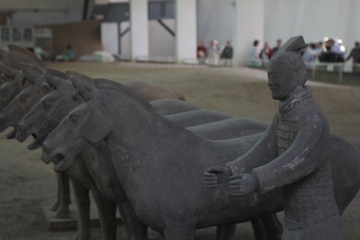 Horses and a soldier of Terracotta Army, in Mausoleum of the First Qin Emperor, an UNESCO world heritage site, in Xian, China
