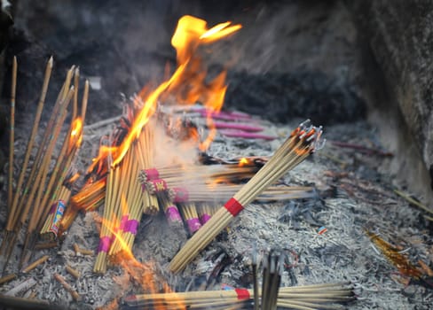 Incense burning in a Buddhist temple in China
