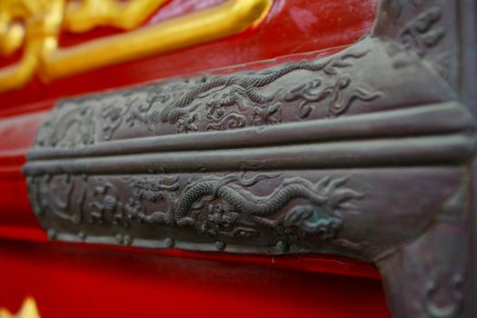Detail of a red and gold door in a Chinese temple