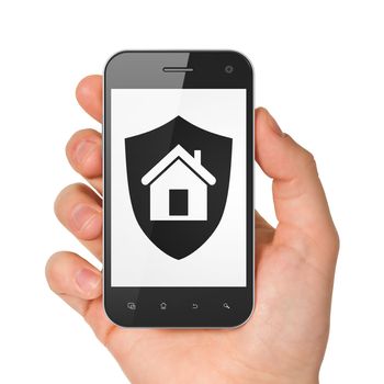 Hand holding smartphone with shield on display. Generic mobile smart phone in hand on white background.