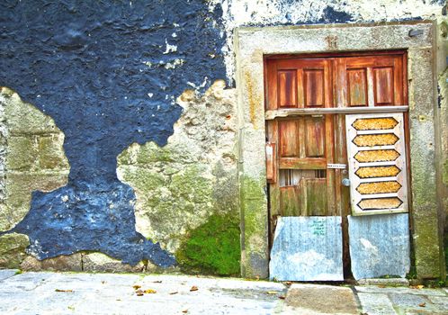 Old wooden door in Portugal. Porto.  