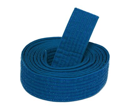 Coiled karate blue belt isolated on white background