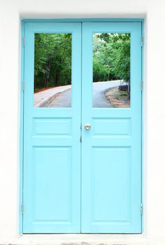 Greek style door with curve road view