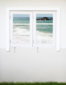 white wooden window with sea view