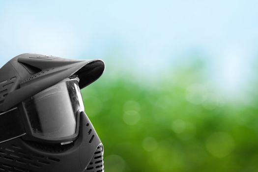 Paintball mask with green background