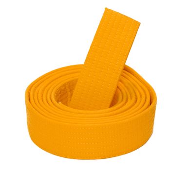 Coiled karate orange belt isolated on white background