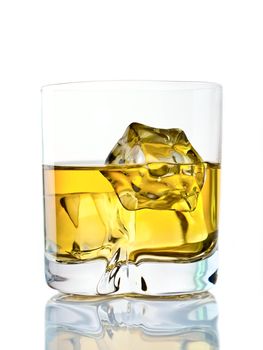 Glass of whiskey on the rocks on white background