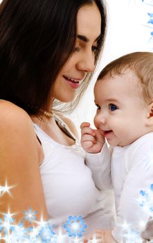 picture of happy mother with baby and snowflakes