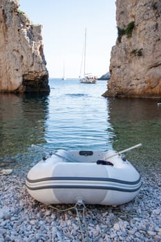 White boat on the beach in Stiniva bay