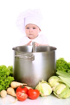 Baby cook with pan and vegetables isolated on a white
