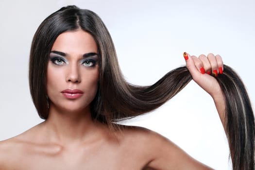 Close up of attractive woman with beautiful long glossy hair