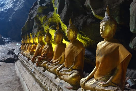 Buddha statue in a cave at Khao Luang temple, Phetchaburi, Thailand