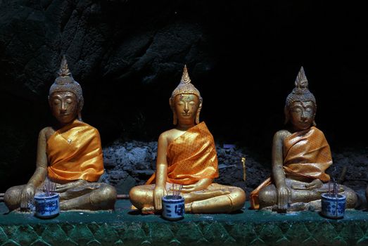 Buddha statue in a cave at Khao Luang temple, Phetchaburi, Thailand