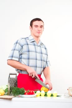 portrait of a man, cut vegetables, make meal