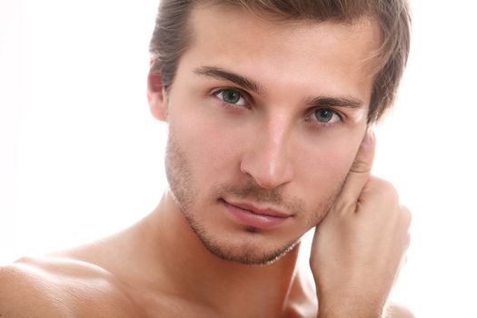 Charming and handsome man face close up over a white background