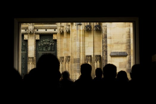 People moving towards Saint Vitus's Cathedral in Prague, Czech Republic