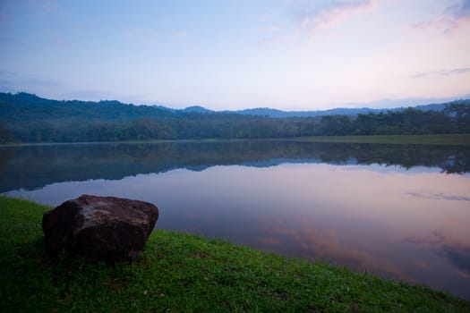 lake and mountain on sunset view of Thailand